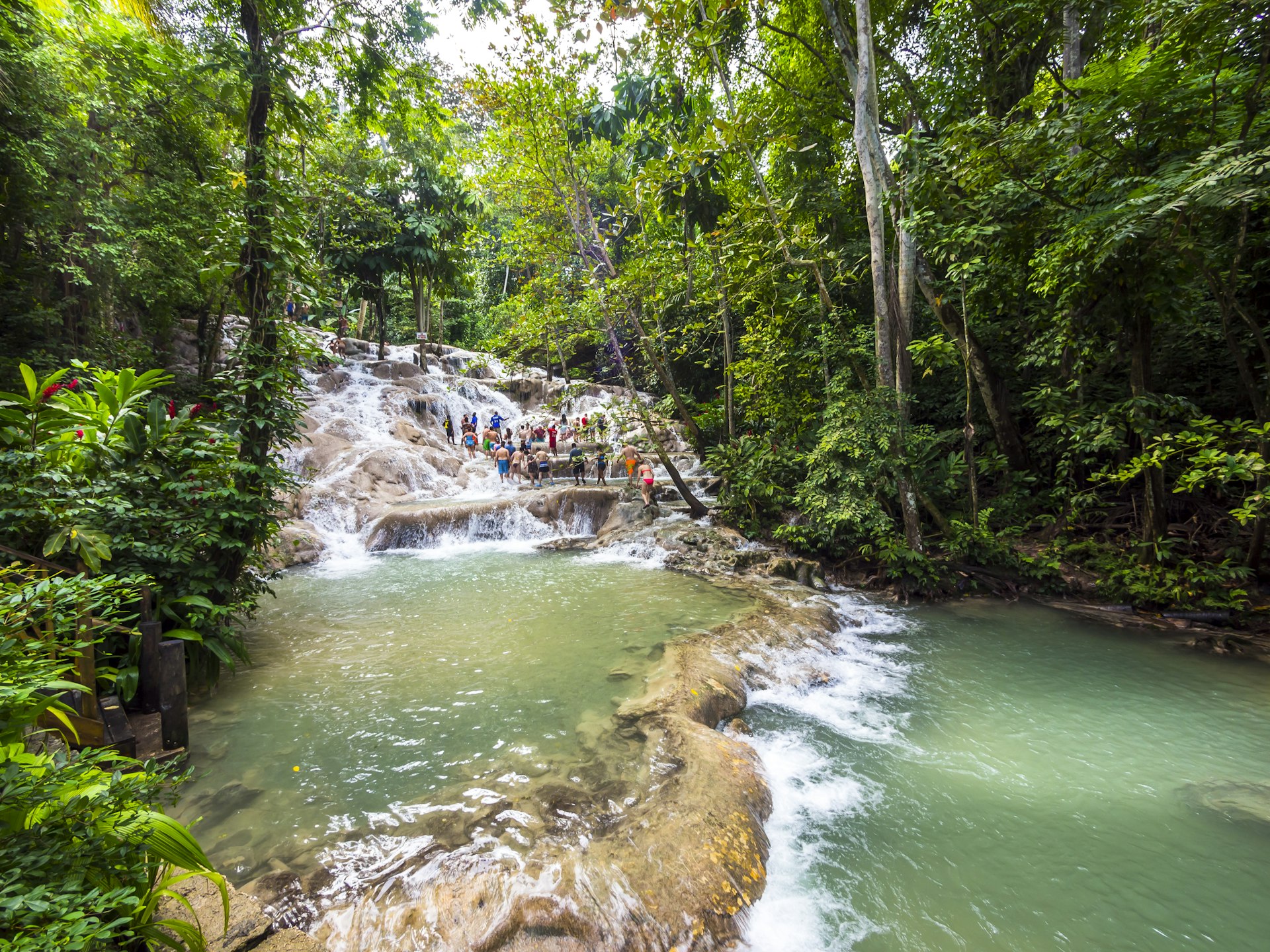 People climbing the cascades at Dunn's River Falls, Jamaica