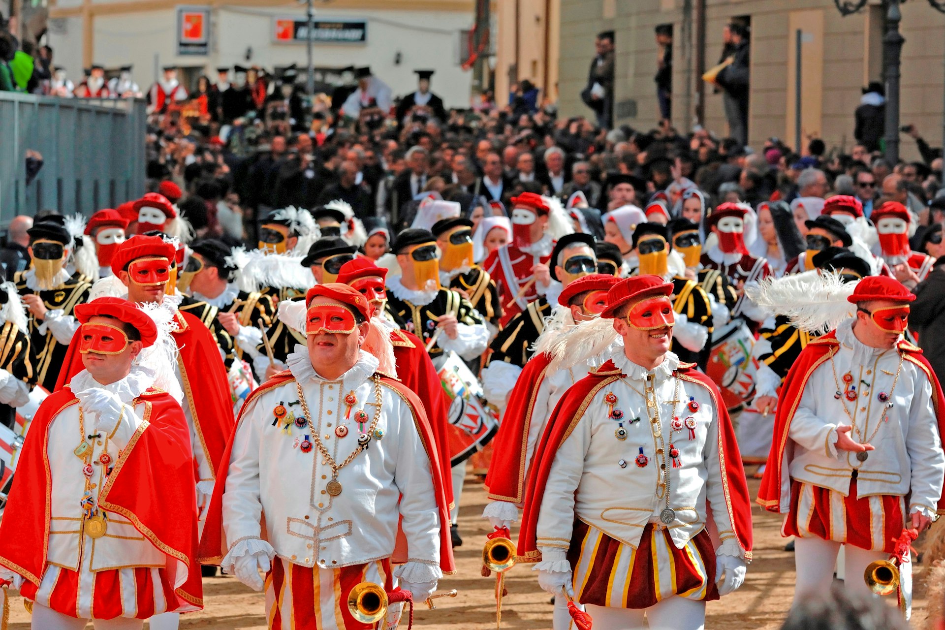 Marchers in costume on parade at the Sa Sartiglia festival, Oristano, Sardinia, Italy