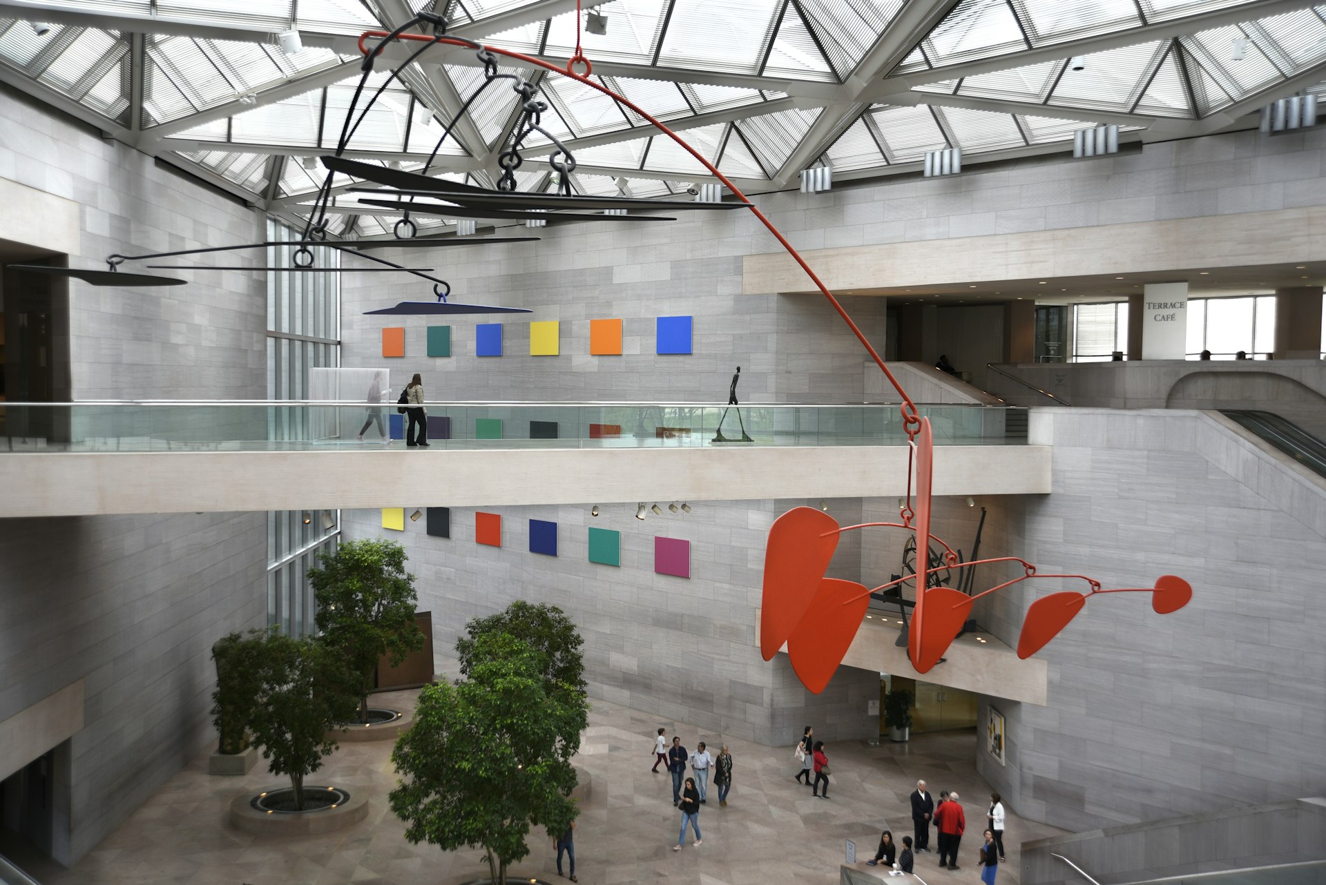 Alexander Calder’s untitled aluminum-and-steel mobile hangs from the ceiling above visitors at the National Gallery of Art’s East Building on the National Mall in Washington, DC, USA