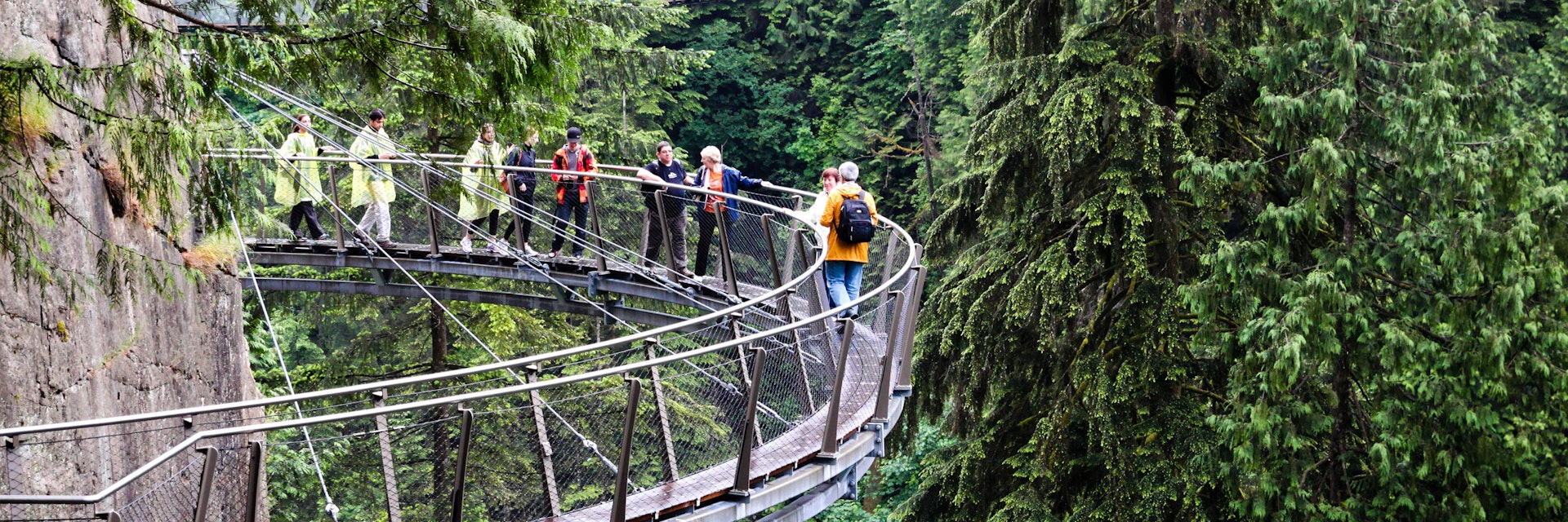 June 29, 2011: Visitors explore the Capilano Cliff Walk through rainforest vegetation. The cantilevered and suspended walkways jut out from the granite cliff face 230 metres above the Capilano River.
510655579
Deep, Hanging, Crossing Bridge, Walking, Tourist, Plant, Granite - Rock, Cliff Walk, Crossing, Anticipation, Travel, Vancouver - Canada, Valley, Bridge, Outdoors, Vancouver, Capilano, Park, Rainforest, Vacations, Forest, Rock, Canada, Adventure, North Vancouver, Woodland, Capilano Park, Suspension Bridge, Horizontal, Scenics - Nature, Bridge - Built Structure, Hill, Cliff, Tree, Suspended Bridge, District Of North Vancouver, Rock - Object, British Columbia, Bridge Crossing, Summer, Photography, Mountain, North America, Public Park, Capilano Suspension Bridge