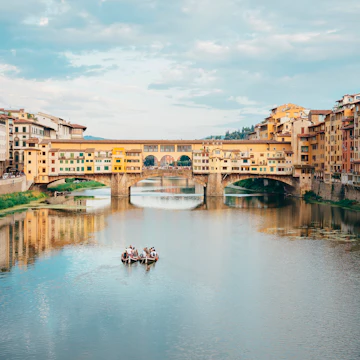 Italy, Florence, River Arno and Ponte Vecchio
591215507
Italy; Incidental People; Water; Water's Edge; Building; City; 2015; Architecture; Bridge - Built Structure; Built Structure; Mode of Transport; Cityscape; History; Travel Destinations; Bridge; Arno; Florence; Tourism; Tuscany; Nautical Vessel; Florence - Italy; Horizontal; Embankment; Ponte Vecchio; International Landmark; River; Day; Riverside; Photography; Cloud - Sky; Sky; Famous Place; Travel; Outdoors; Color Image; City Break;