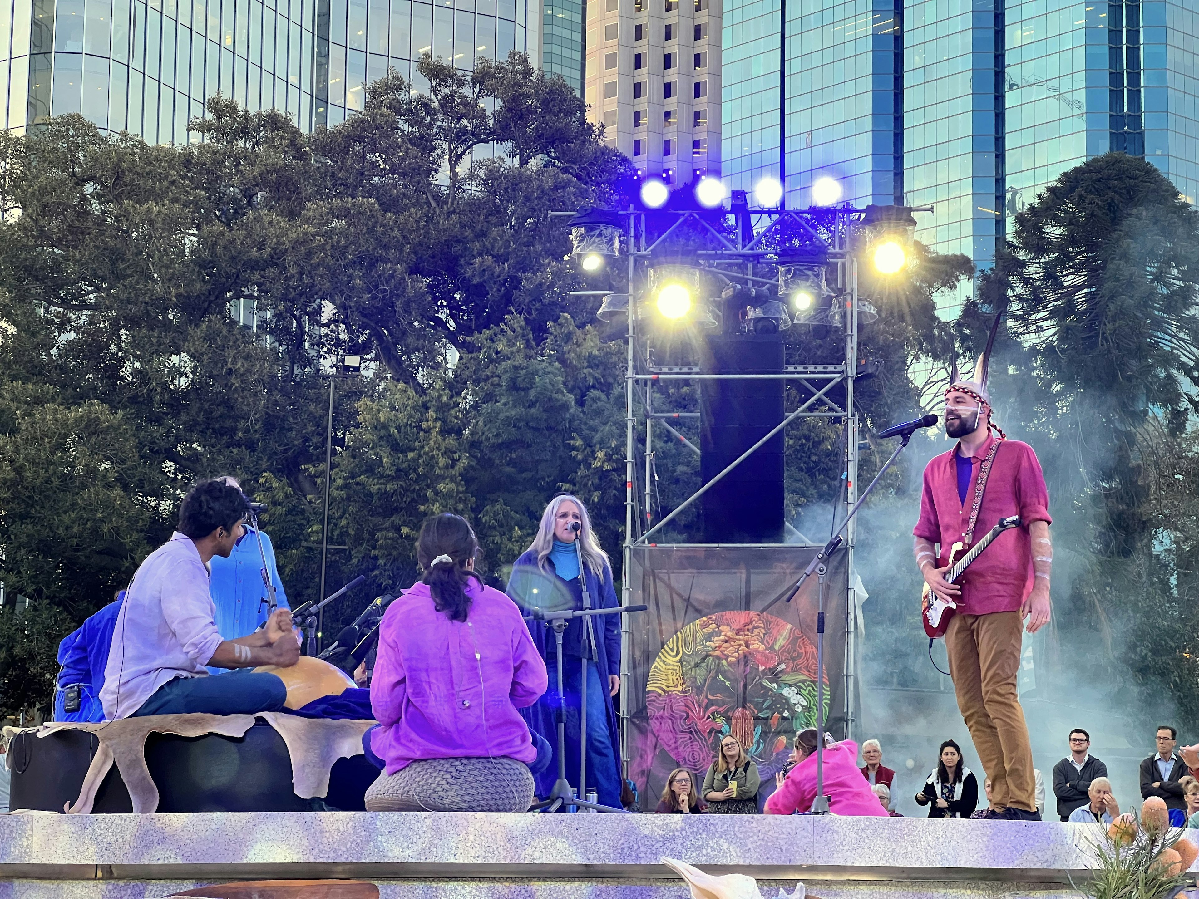 Song Circle performing on stage at the EverNow Festival in Perth