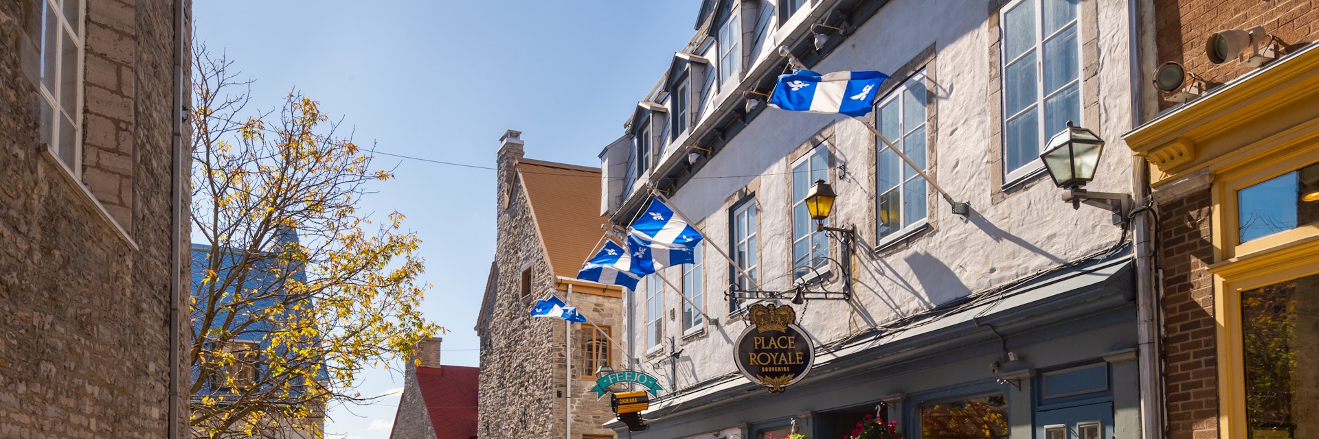 Quebec City, Canada - 5 October 2019: Quebec flags on Notre-Dame street.
1179423899
