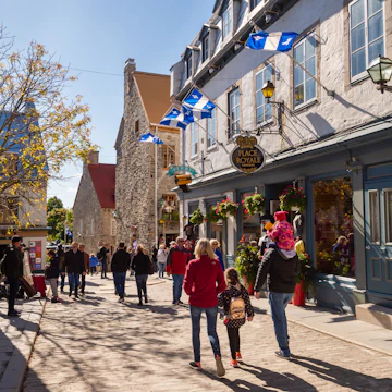 Quebec City, Canada - 5 October 2019: Quebec flags on Notre-Dame street.
1179423899