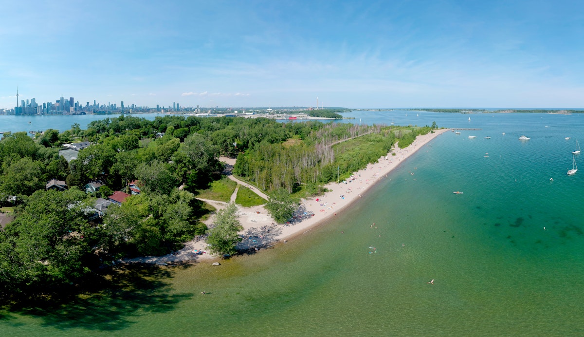 Toronto Central Islands and Ward's Island Park beach, Ontario, Canada, aerial view from top at sunny greenery and sandy coast with boats, people swimming at summer. Popular tourist location.
1261754618
