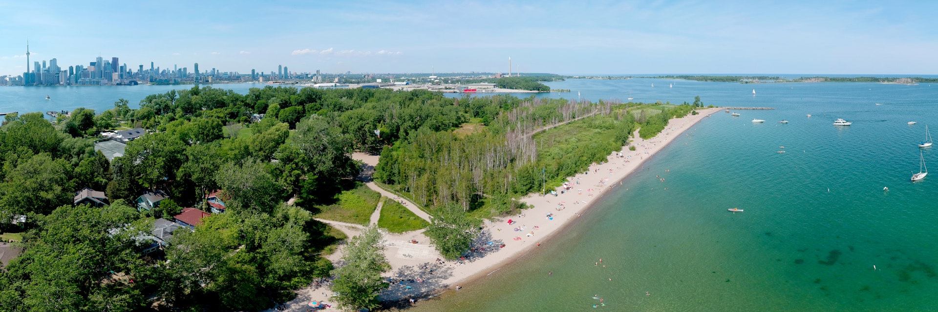 Toronto Central Islands and Ward's Island Park beach, Ontario, Canada, aerial view from top at sunny greenery and sandy coast with boats, people swimming at summer. Popular tourist location.
1261754618