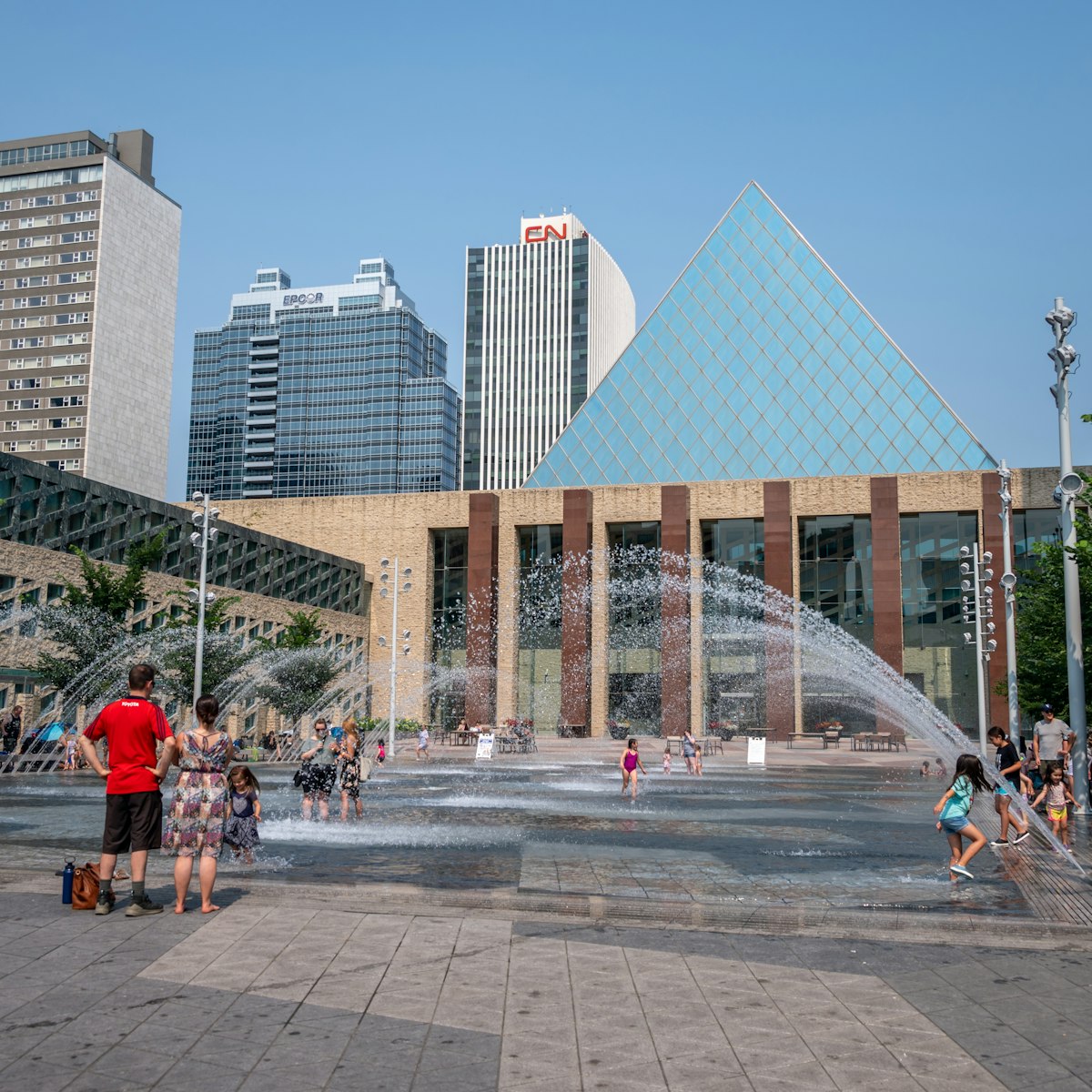 Edmonton, Alberta - July 30, 2021: People playing in the fountains in front of Edmonton city hall.
1332928844
canadian, children, city hall, hot day, kids, municipal building, splash park