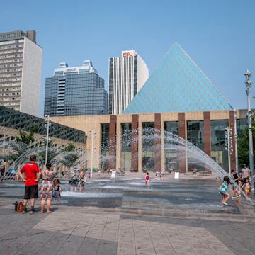 Edmonton, Alberta - July 30, 2021: People playing in the fountains in front of Edmonton city hall.
1332928844
canadian, children, city hall, hot day, kids, municipal building, splash park