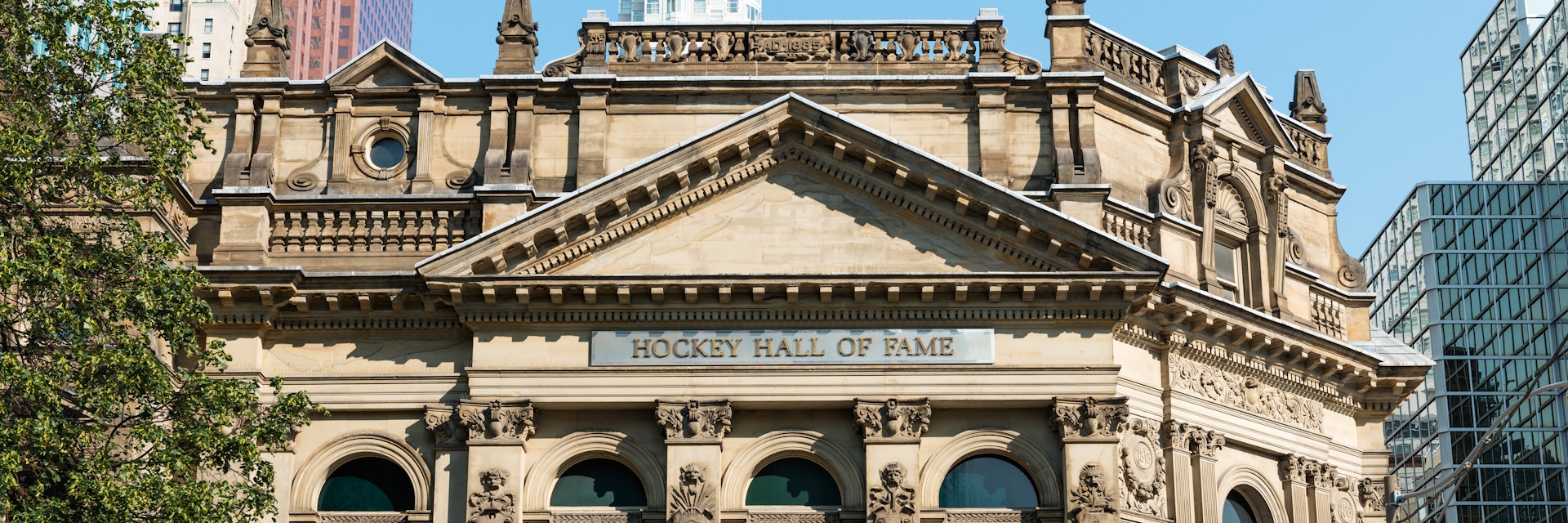 Toronto, Canada - September 5, 2015: Front facade of the Hockey Hall of Fame in Toronto, Ontario, a building dedicated to the history of ice hockey and home to the Stanley Cup.
493697002
National Hockey League, Front Street, Stanley Cup, City Life, Fame, Collection, Downtown District, Souvenir, Exhibition, Facade, Art Museum, Skyscraper, Sidewalk, Canadian Culture, History, Blue, International Landmark, Famous Place, Architecture, Sport, Wide Angle, Urban Scene, Ice Hockey, Sports Team, Toronto, Ontario - Canada, Canada, North America, Summer, Trophy, Bank, Museum, Street, Avenue, Tower, Built Structure, Financial District, City, Cup, Hall Of Fame, Hockey Hall Of Fame
