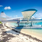 Garden Key, FL / USA - 02-09-2015: Woman boards seaplane on beach shore at Dry Tortugas  National Park in the Florida keys.
1315689056
aircraft, airplane, beach, beautiful, boarding, boat, caribbean, clouds, destination, dry tortugas, dry tortugas national park, embark, environment, environmental, female, fl, flight, float, floatplane, florida, flying, fort jefferson, historic, holiday, island, ocean, outdoors, park, planes, propeller, reef, reflect, reflection, reflections, sea, sea plane, seaplane, seaplane beach scene, site, tortugas, transport, transportation, travel, trip, usa, vacation, vehicle, water, woman
