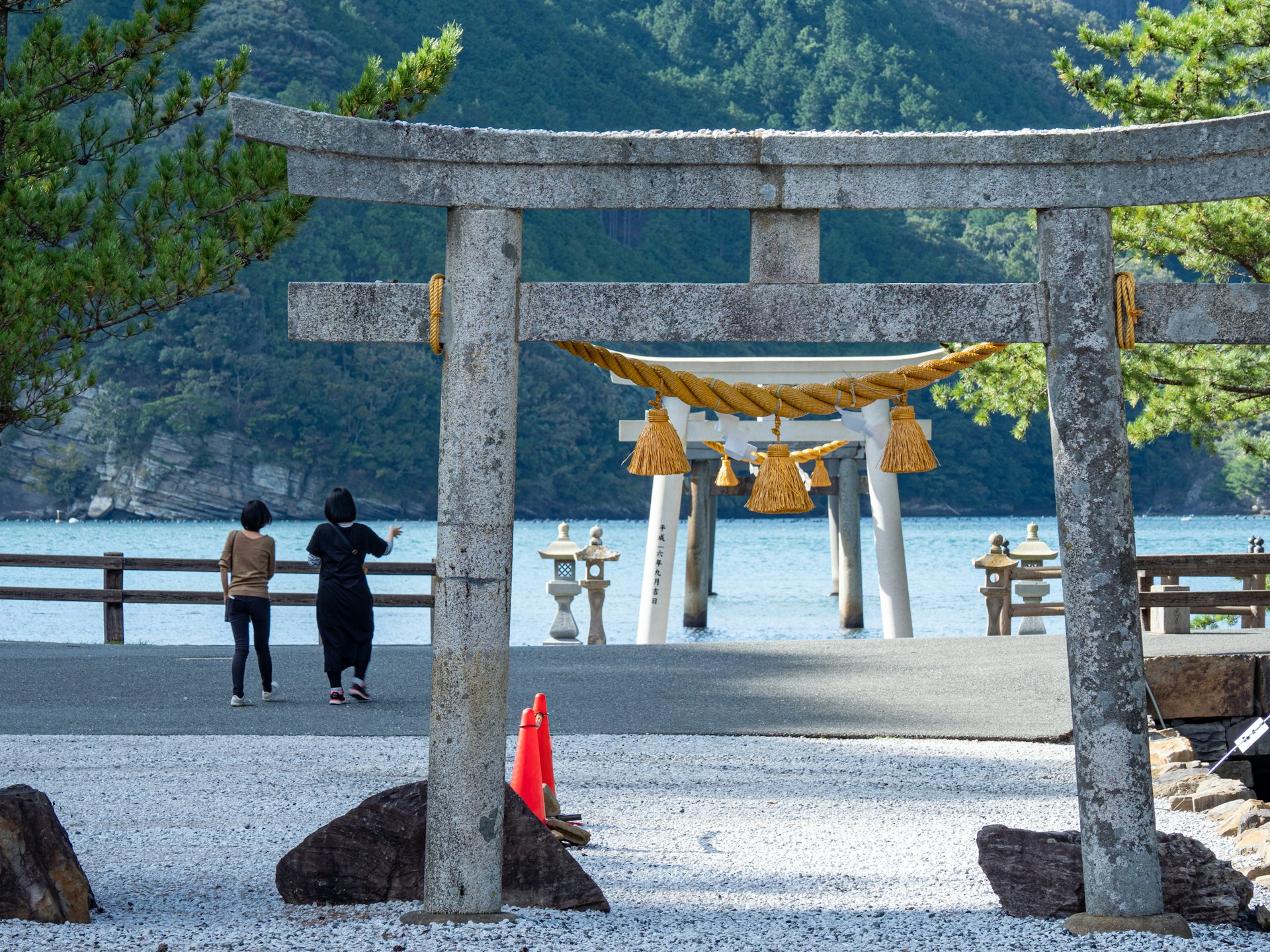 People at the torii at Watazumi Shrine, Tsushima, Nagasaki Prefecture, Japan
