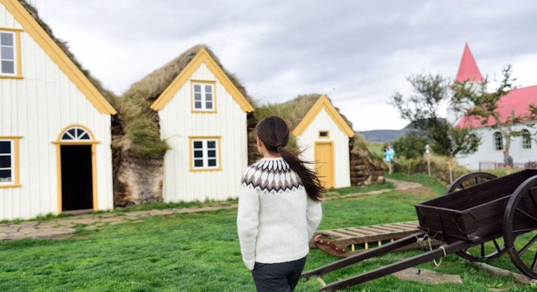 Iceland tourist by Old Farmhouse Laufas Glaumbaer farm Folk Museum turf roof houses in Varmahlid, Skagafjordur. Icelandic tourist destination and attraction landmark. Woman walking Icelandic sweater.; Shutterstock ID 1789772660; GL: 65050; netsuite: Online ed; full: Iceland alternative experiences; name: Claire Naylor
1789772660