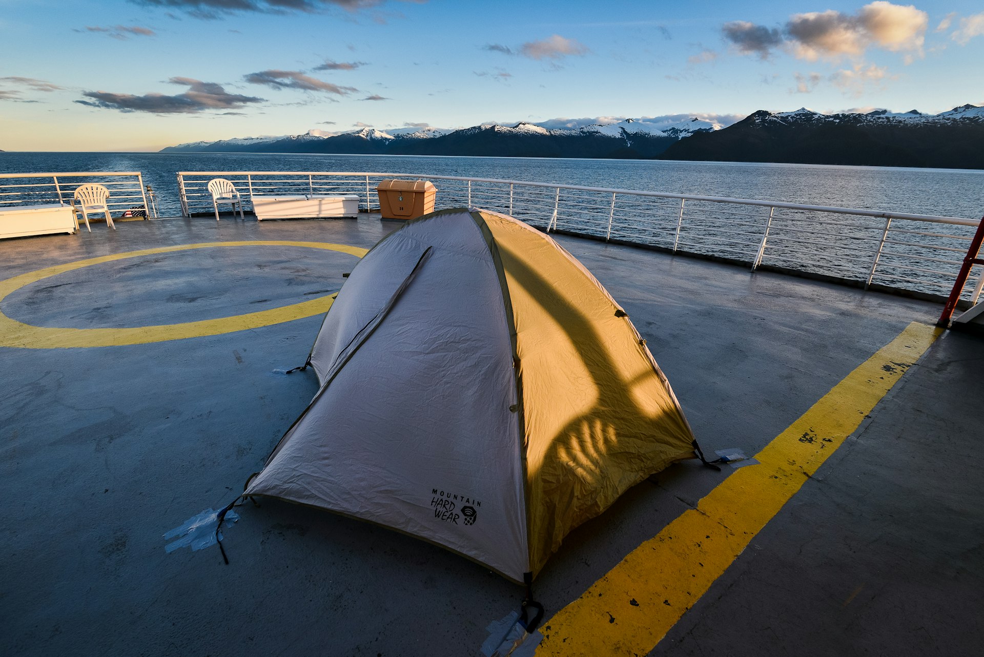 A tent on a deck on a ferry, part of the Alaska Marine Highway, Inside Passage, Alaska, USA