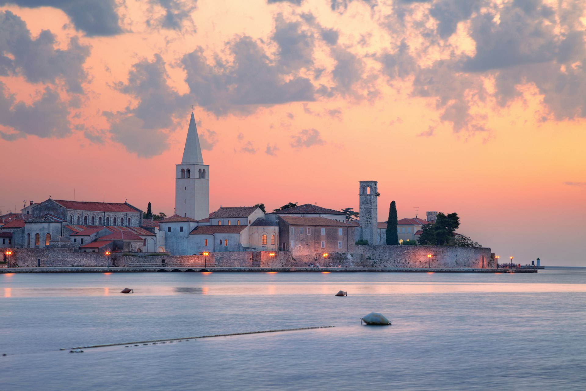 Cityscape image of Porec, Croatia with the Euphrasian Basilica located on Istrian Peninsula at summer sunse