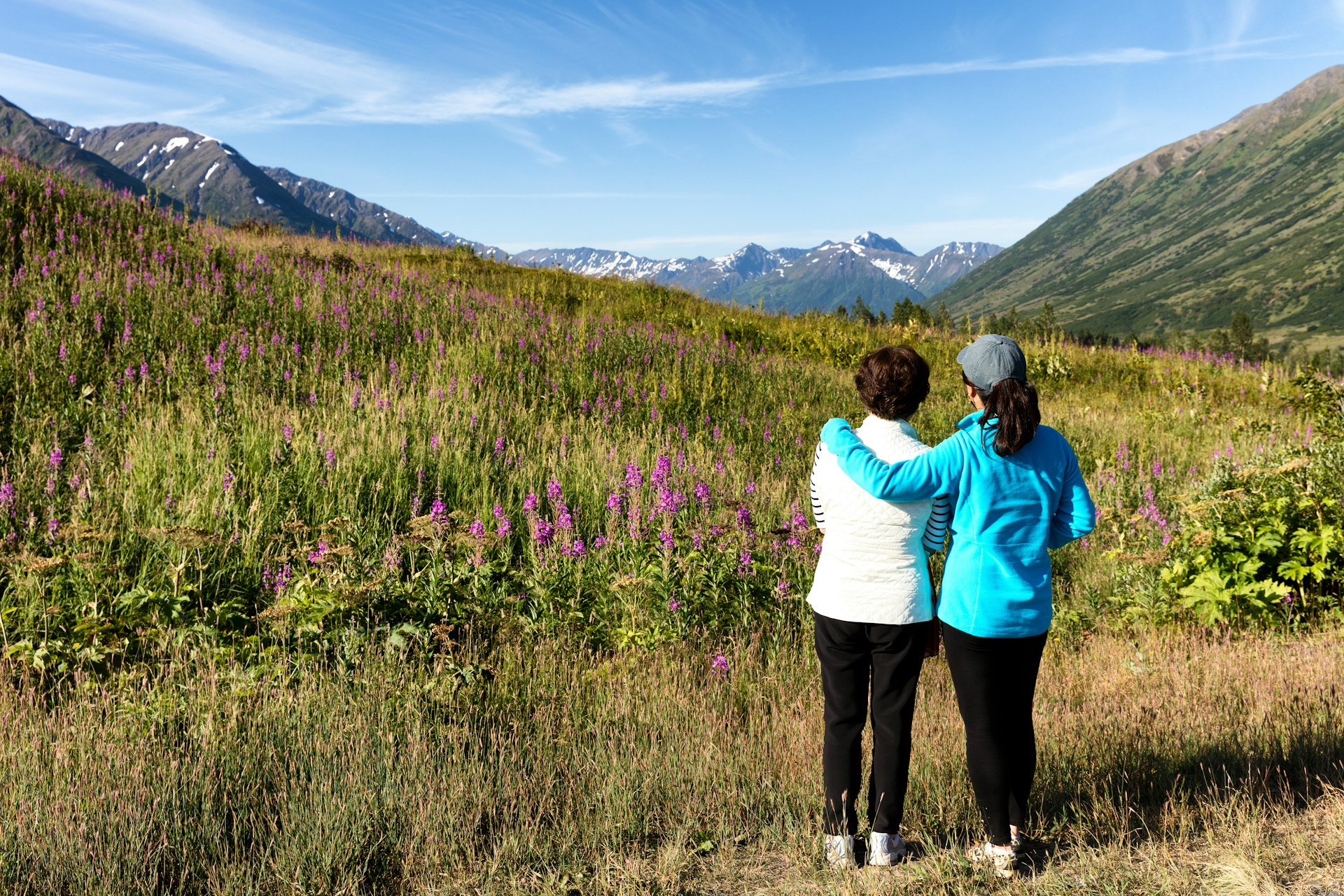 Two women hikers looking at the landscape in Denali National Park, Alaska