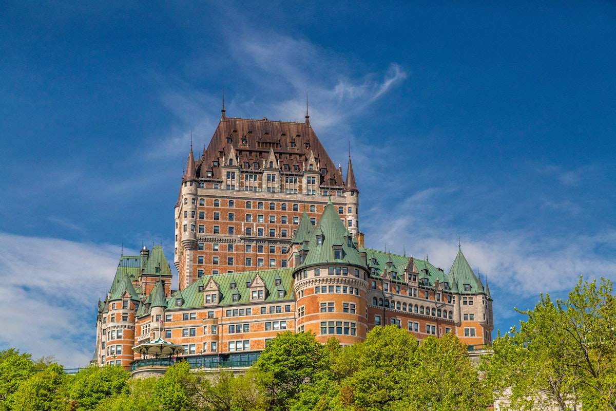 Low-angle view of Chateau Frontenac.
1458223256
architecture, attraction, building, canada, canadian, chateau, chateau frontenac, city, cityscape, famous, french, frontenac, historic, historical, history, hotel, landmark, patina, quebec canada, quebec city, tourism, travel