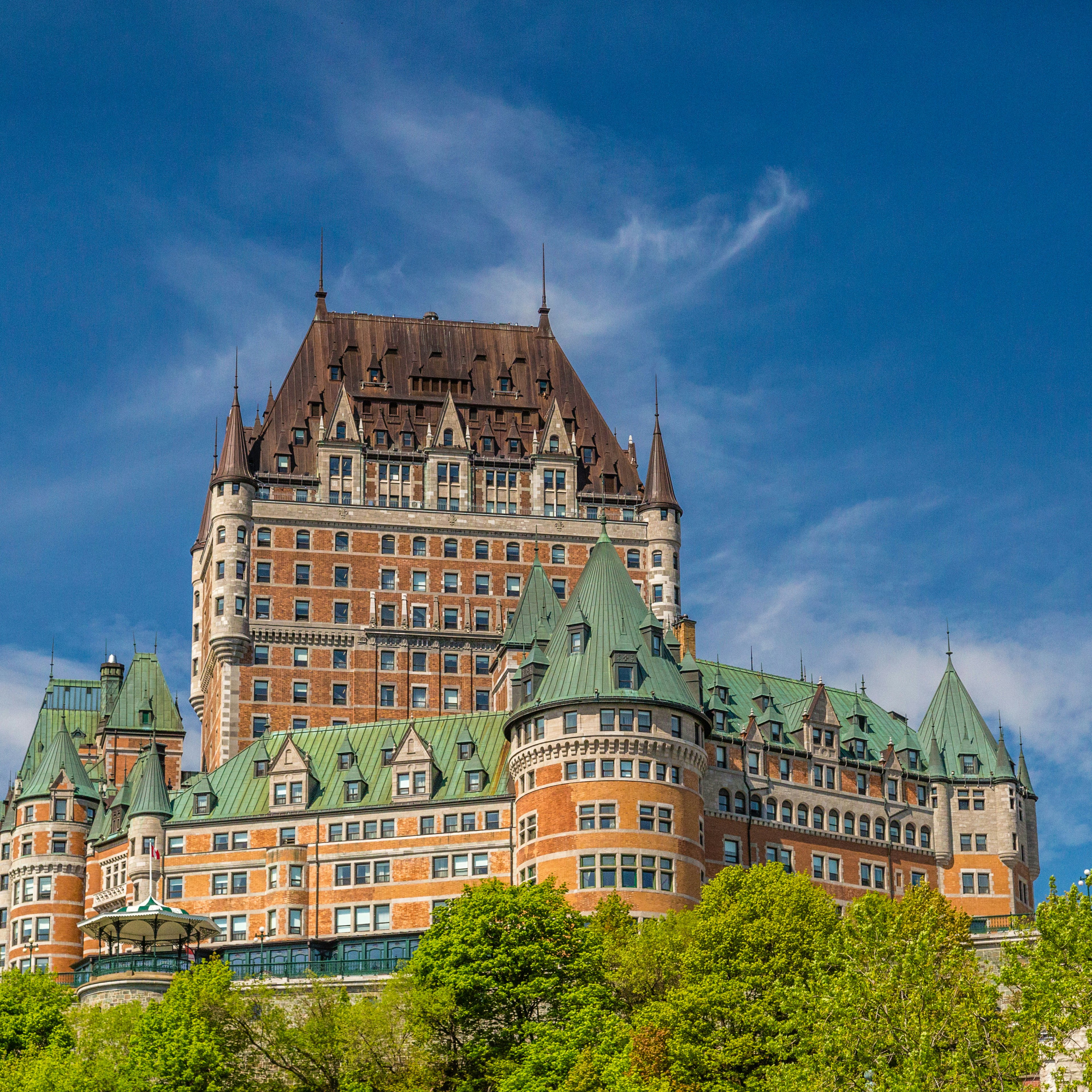 Low-angle view of Chateau Frontenac.
1458223256
architecture, attraction, building, canada, canadian, chateau, chateau frontenac, city, cityscape, famous, french, frontenac, historic, historical, history, hotel, landmark, patina, quebec canada, quebec city, tourism, travel
