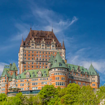 Low-angle view of Chateau Frontenac.
1458223256
architecture, attraction, building, canada, canadian, chateau, chateau frontenac, city, cityscape, famous, french, frontenac, historic, historical, history, hotel, landmark, patina, quebec canada, quebec city, tourism, travel
