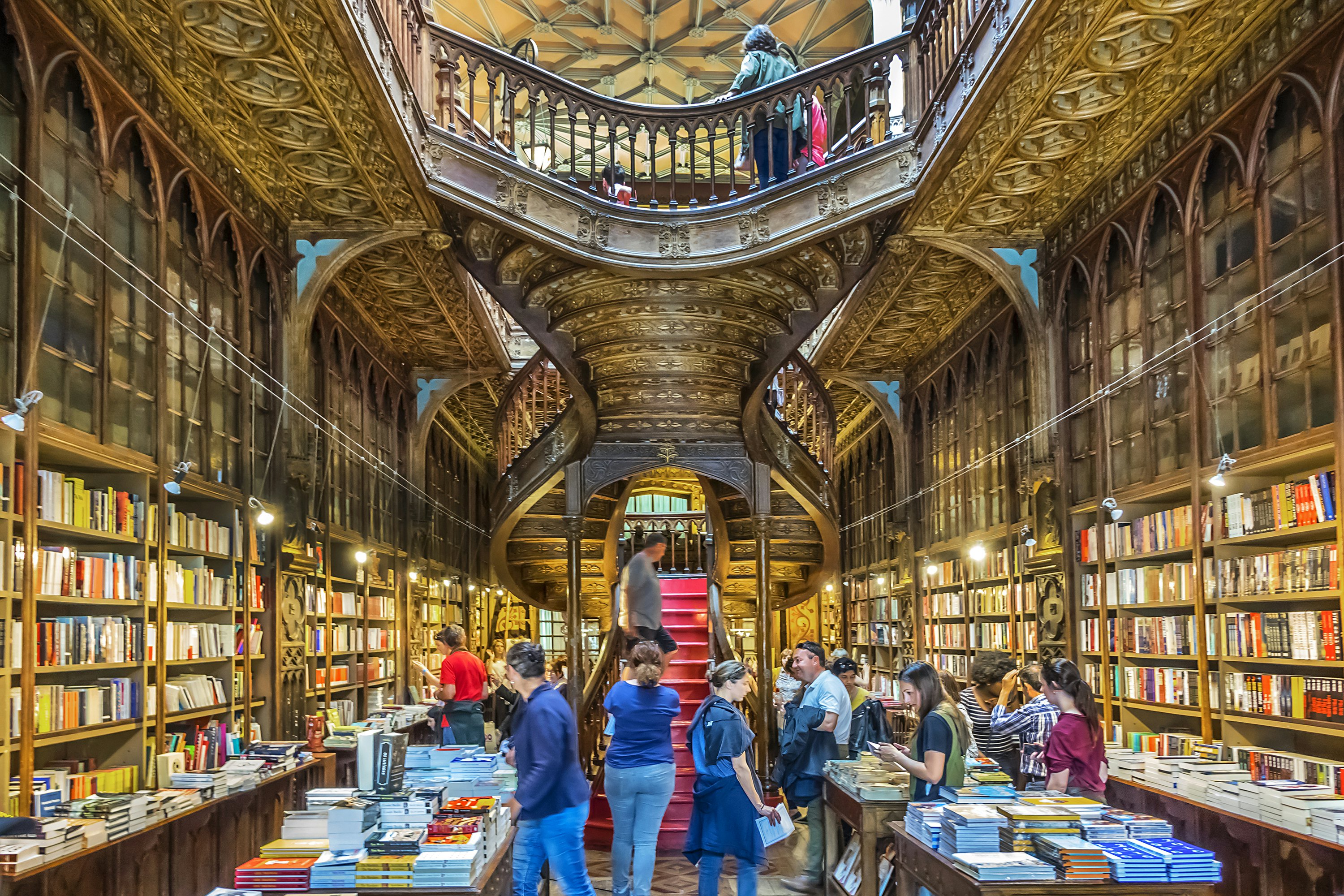 APRIL 19, 2017: Customers browse books inside the famous bookshop, Lello e Irmao (1906).
785980567
architecture, art, art-nouveau, attraction, neo-gothic, book, bookshop, bookstore, building, century, capital, culture, commerce, design, detail, decorated, europe, european, eu, famous, historic, historical, irmao, landmark, location, lello, livraria, nouveau, old, oporto, ornate, picturesque, porto, portugal, portuguese, shop, sight, sightseeing, store, travel, trip, tourism, inside, indoor, interior, bookshelf, shelf, wooden