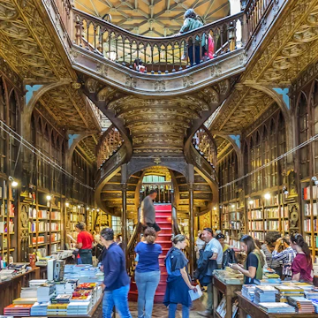 APRIL 19, 2017: Customers browse books inside the famous bookshop, Lello e Irmao (1906).
785980567
architecture, art, art-nouveau, attraction, neo-gothic, book, bookshop, bookstore, building, century, capital, culture, commerce, design, detail, decorated, europe, european, eu, famous, historic, historical, irmao, landmark, location, lello, livraria, nouveau, old, oporto, ornate, picturesque, porto, portugal, portuguese, shop, sight, sightseeing, store, travel, trip, tourism, inside, indoor, interior, bookshelf, shelf, wooden