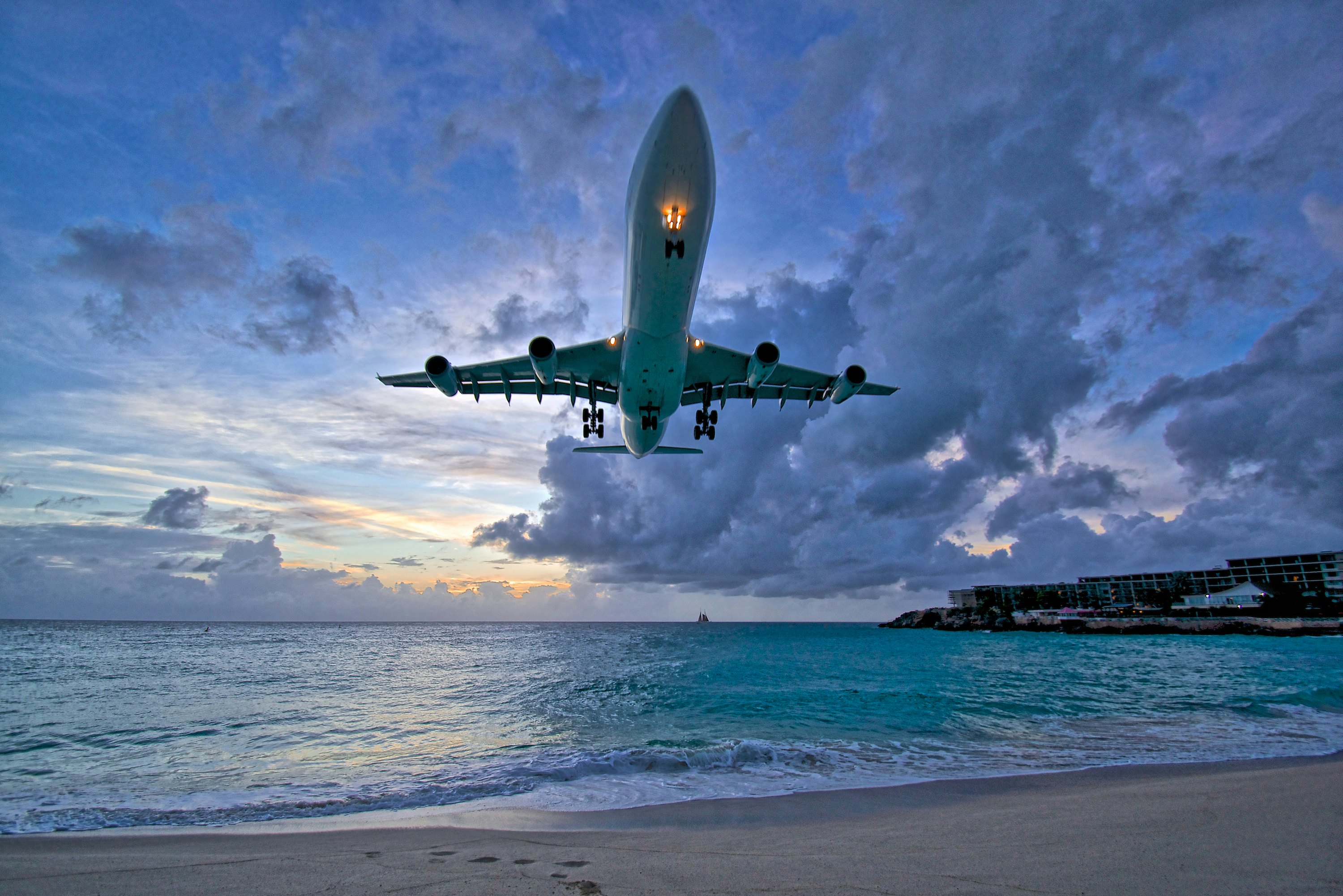 Air France A340 landing at Princess Juliana International Airport during sunset on St.Maarten in the Caribbean