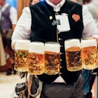waiter carrying a lot of beer glasses in beer garden at Octoberfest in Munich
1178553388