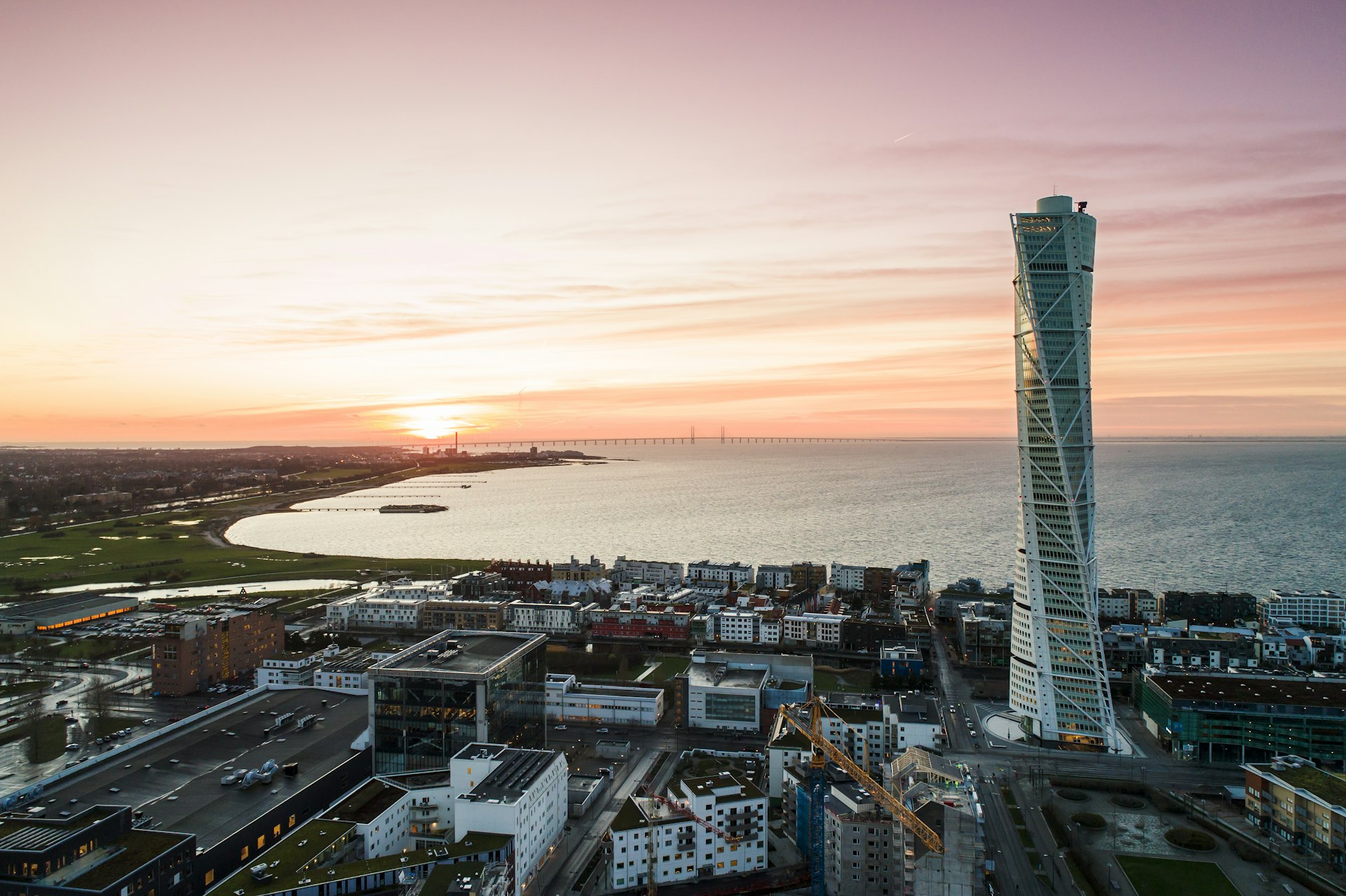 Aerial view of a residential area near the sea, with Turning Torso tower, Malmö, Sweden
