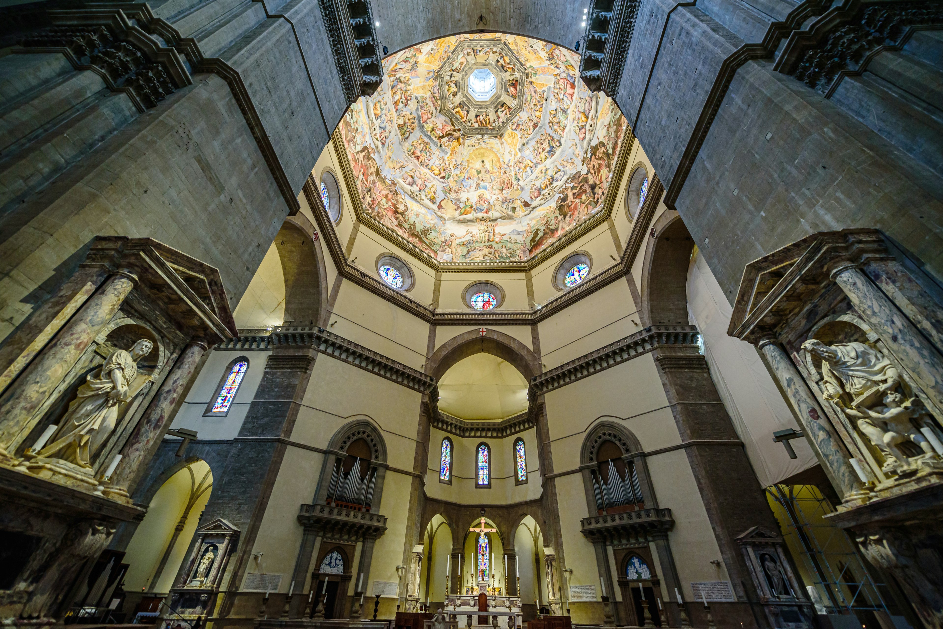 Looking up into the frescoed dome inside Florence's Duomo, the Cathedral of Santa Maria del Fiore