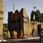 Tha Pae Gate, Chiang Mai a tuktuk and four unrecognizable young monks.
183344509
Surrounding Wall, Travel, People Traveling, Tourism, Jinrikisha, Men, East Asian Culture, Brick, Buddhism, Asian Ethnicity, Chiang Mai Province, Thailand, Transportation, Blurred Motion, Monk - Religious Occupation, People, Asia, Gate, Flag, Land Vehicle, Travel Locations, People, Transportation, Tha Pae