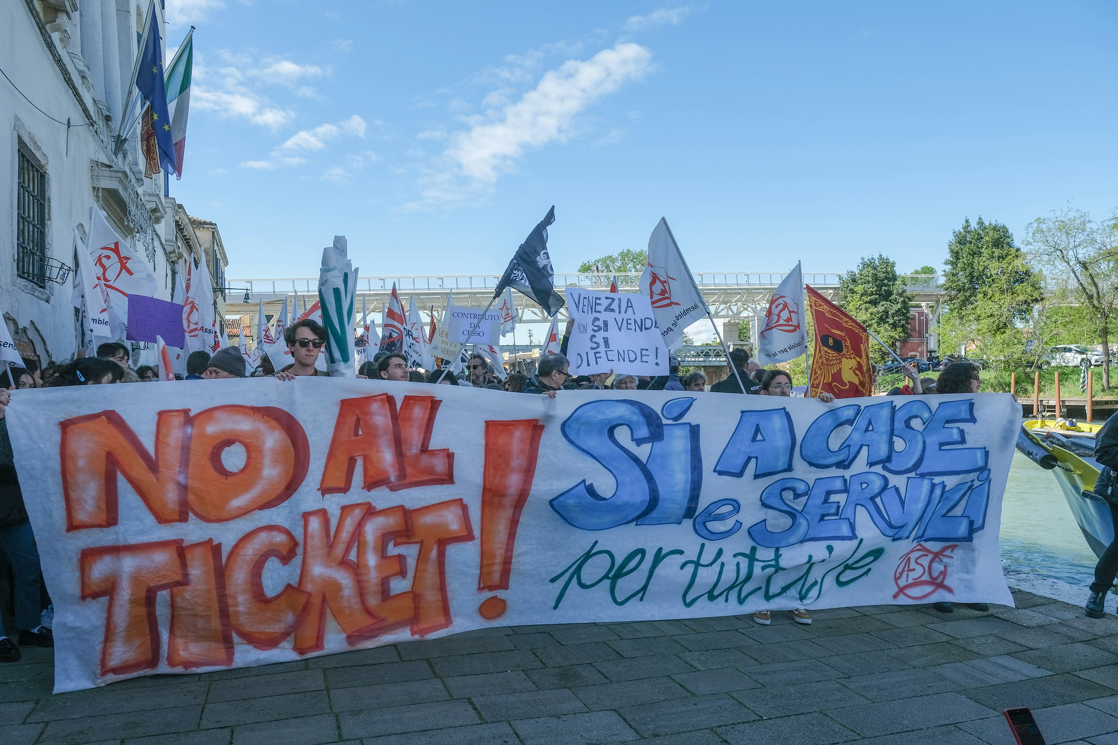 Protesters start walking at Piazzale Roma, opposing the charge for tourists to enter the city