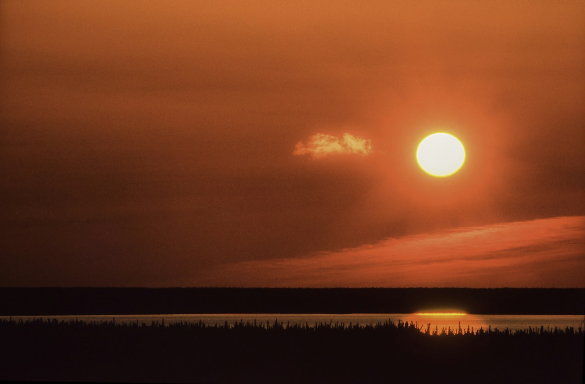 Midnight sun over the Mackenzie River, near Inuvik, Northwest Territories, Canada