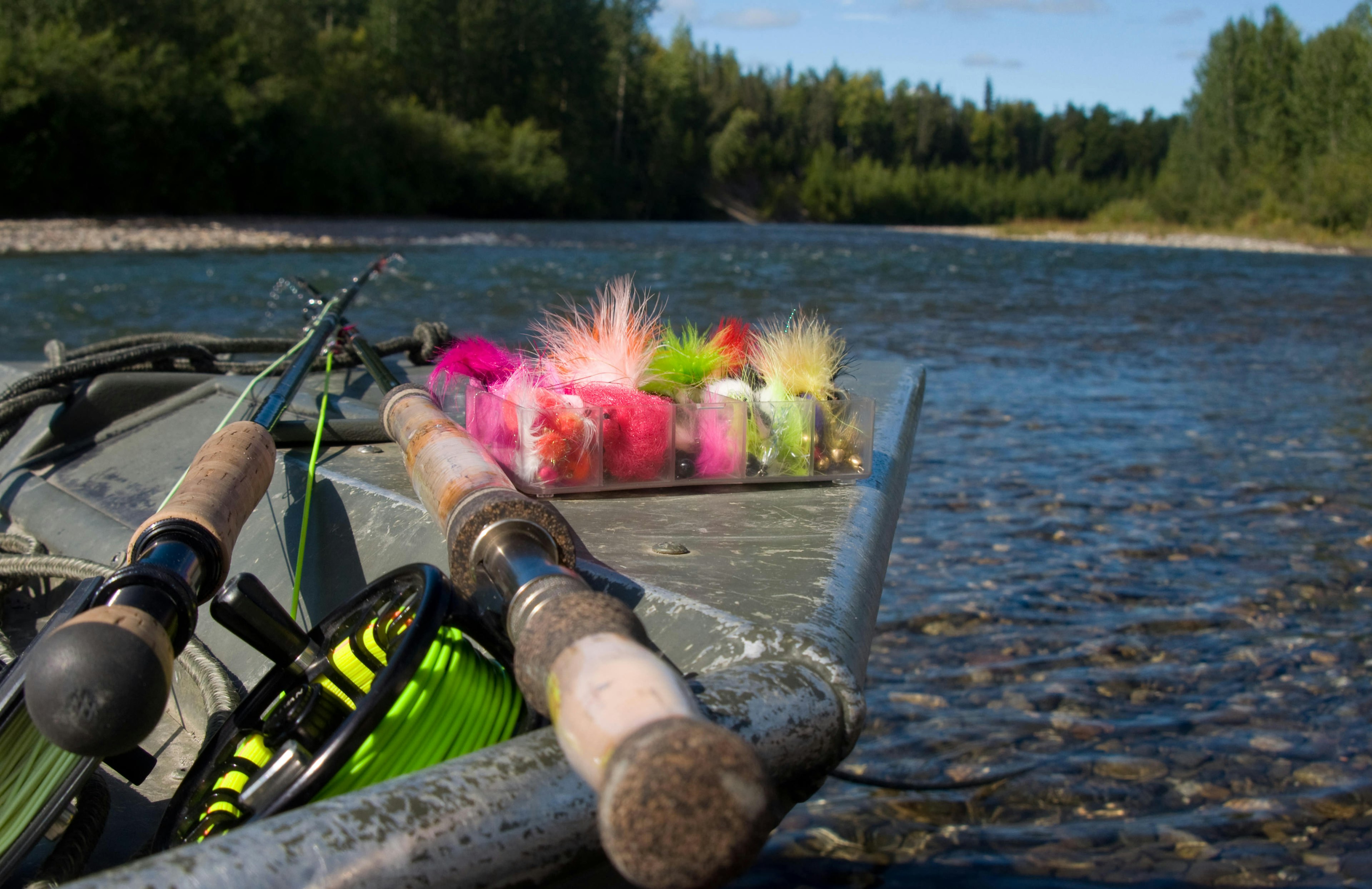 Fly fishing for salmon from a boat in Alaska