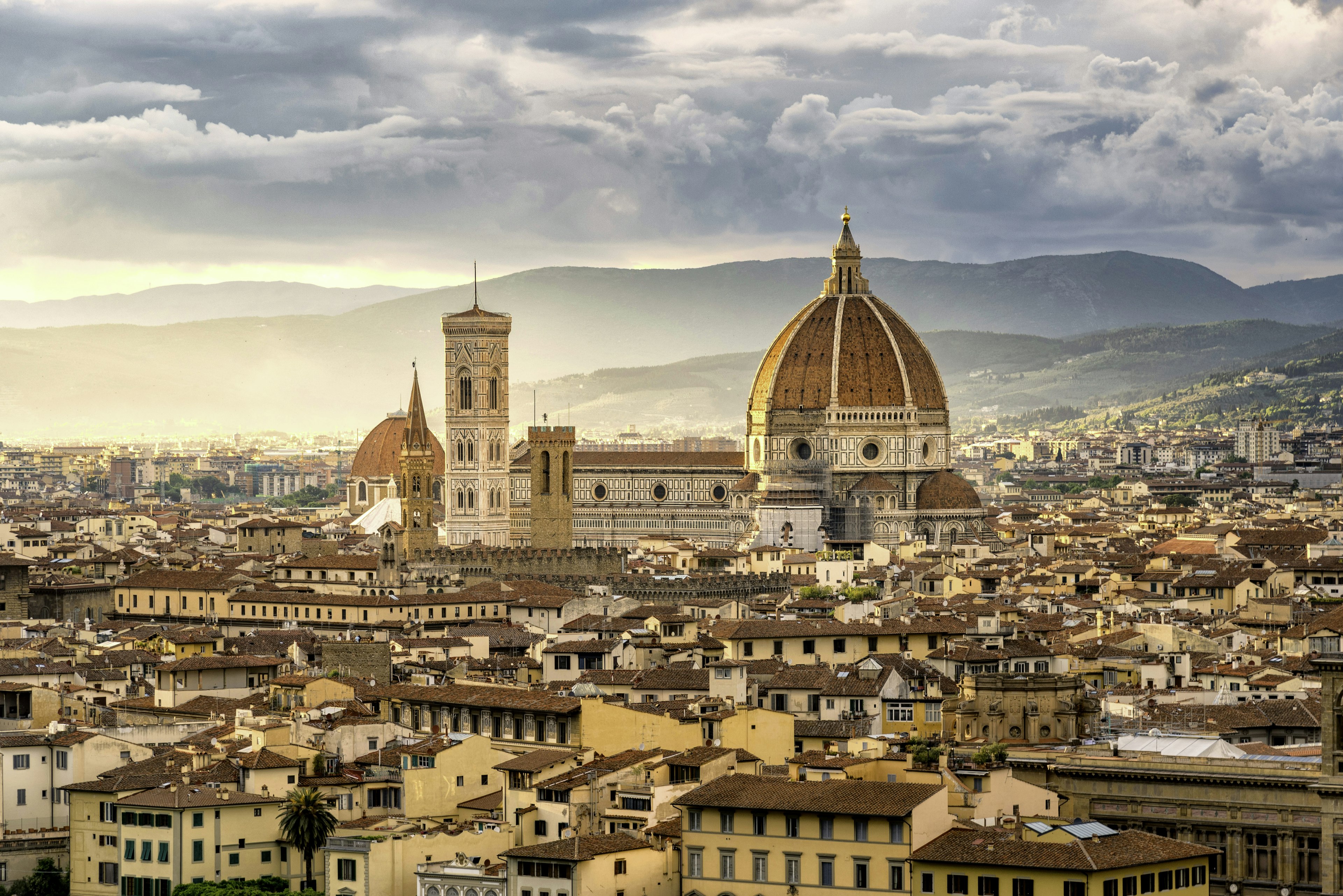 The red domed roof of a cathedral dominating a skyline