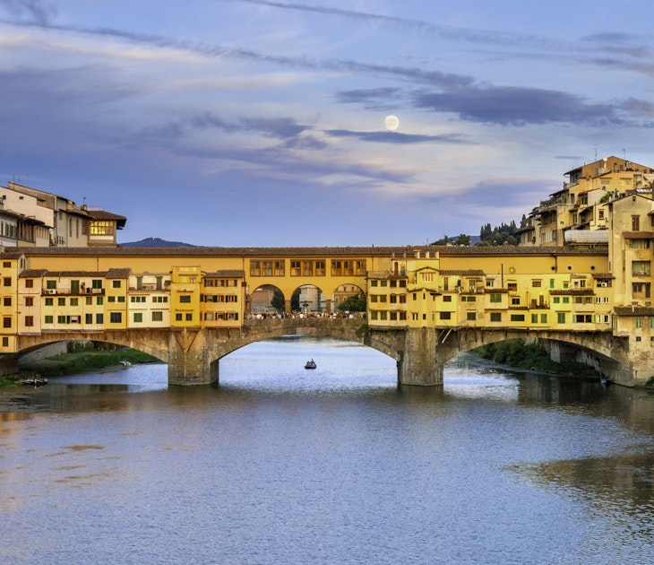 570293619
Vibrant Color; Florence - Italy; Moon; Cityscape; Horizontal; Bridge - Built Structure; Ponte Vecchio; Arno River; Travel Destinations; Ancient; Old Town; Sunset; International Landmark; Outdoors; Italy; UNESCO World Heritage Site; Photography; Overcast; Rowboat; Florence; Tuscany;
Ponte Vecchio