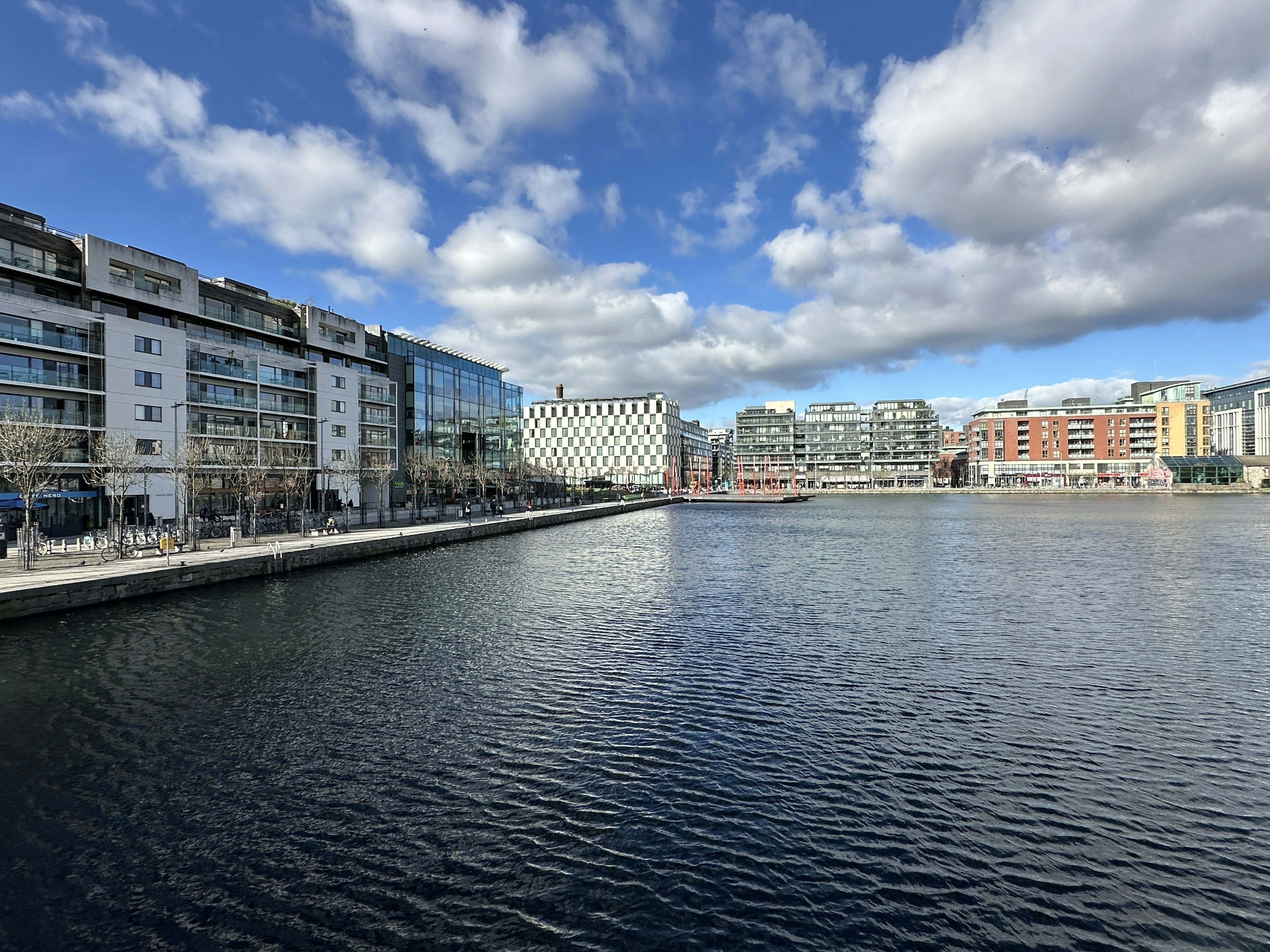A dock surrounded by modern buildings