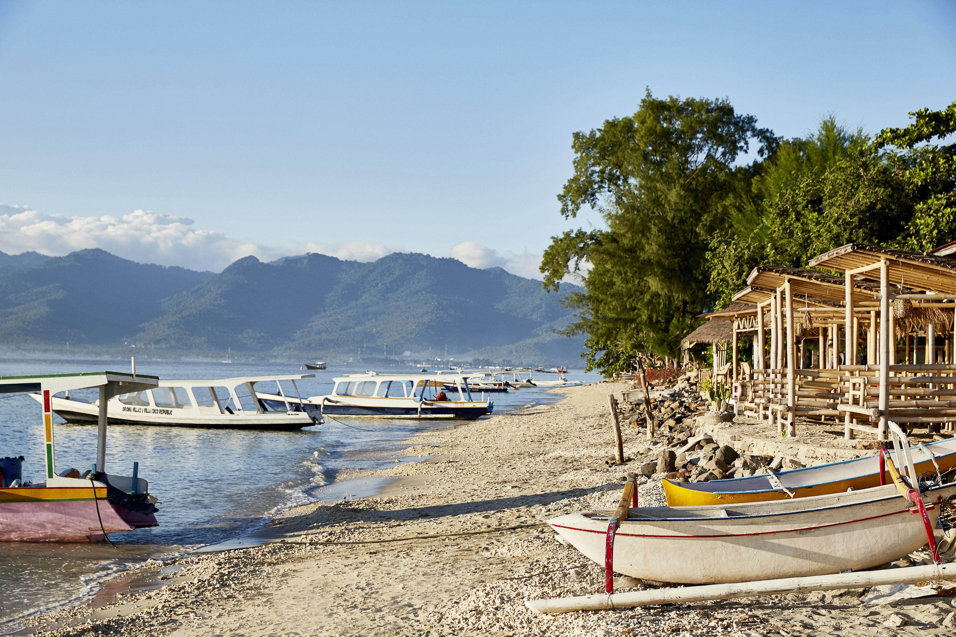 Beach huts and boats on Gili Air island, just off the coast of Lombok.