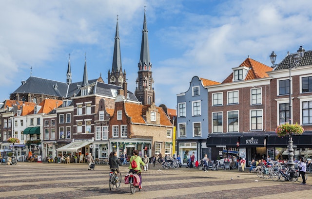 Delft market square with the spires of Maria van Jesse Church in the background