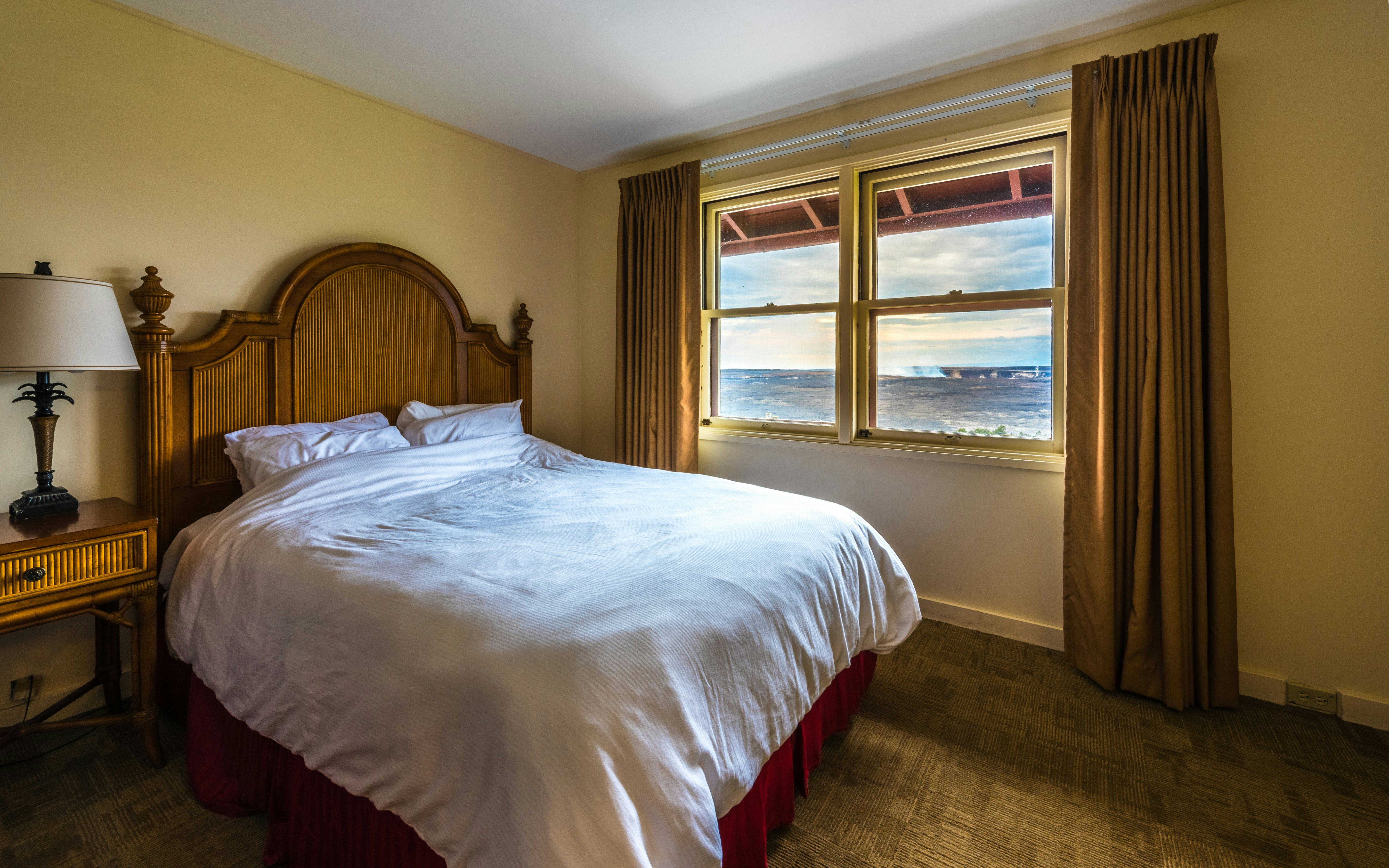 A room at Volcano House with a view of Halemaʻumaʻu Crater, Hawai‘i Volcanoes National Park, Hawaii, USA