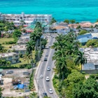 Montego Bay, Jamaica - March 27 2015: Aerial/Drone view near coastline in tourism resort city of Montego Bay, Jamaica. Turquoise ocean water along the coast of tropical Caribbean island.; Shutterstock ID 1157128060; GL: 65050; netsuite: Online ed; full: Jamaica getting around; name: Claire N
1157128060