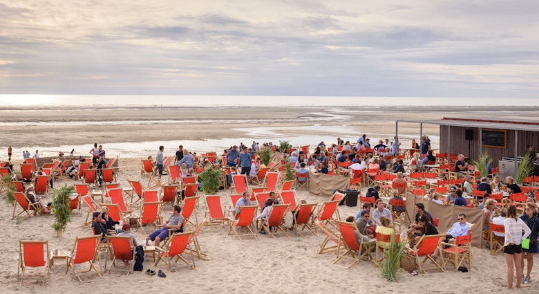 LE TOUQUET, FRANCE. AUG. 11, 2018. Beach bar with people sitting on beach chairs with together with friends. Sunset at the beach in Le Touquet Paris Plage, France.; Shutterstock ID 1190590147; GL: 65050; netsuite: Lonely Planet Online Editorial; full: Guide to Cote d'Opale; name: Brian Healy
1190590147
bar, beach, club, coast, coastline, cocktails, colorful, dance, disco, drinks, europe, festival, france, french, friends, fun, happy, holiday, horizon, huts, ibiza, landscape, lifestyle, music, night, nightlife, north, ocean, outdoor, outside, paris, party, pas de calais, people, plage, sand, scenic, sea, seaside, shore, summer, sunset, touquet, touquet-paris-plage, tourism, travel, tropical, vacation, view