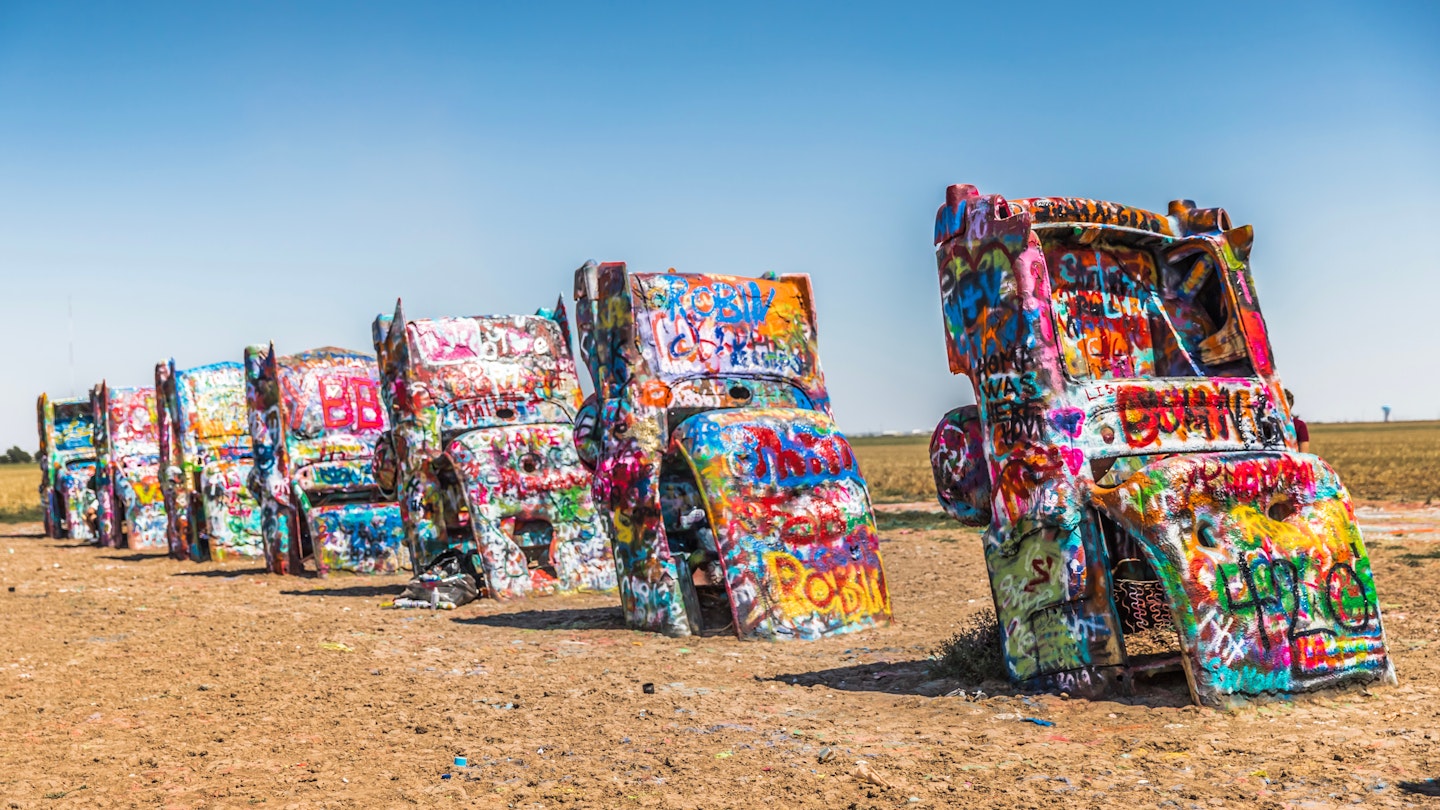 Amarillo, Texas / USA - July 24, 2019: Cadillac Ranch, located along I-40, is a public art sculpture of antique Cadillacs buried nose-down in a field.; Shutterstock ID 1484304152; GL: 65050; netsuite: Lonely Planet Online Editorial; full: Best EV road trips in the USA; name: Brian Healy
1484304152