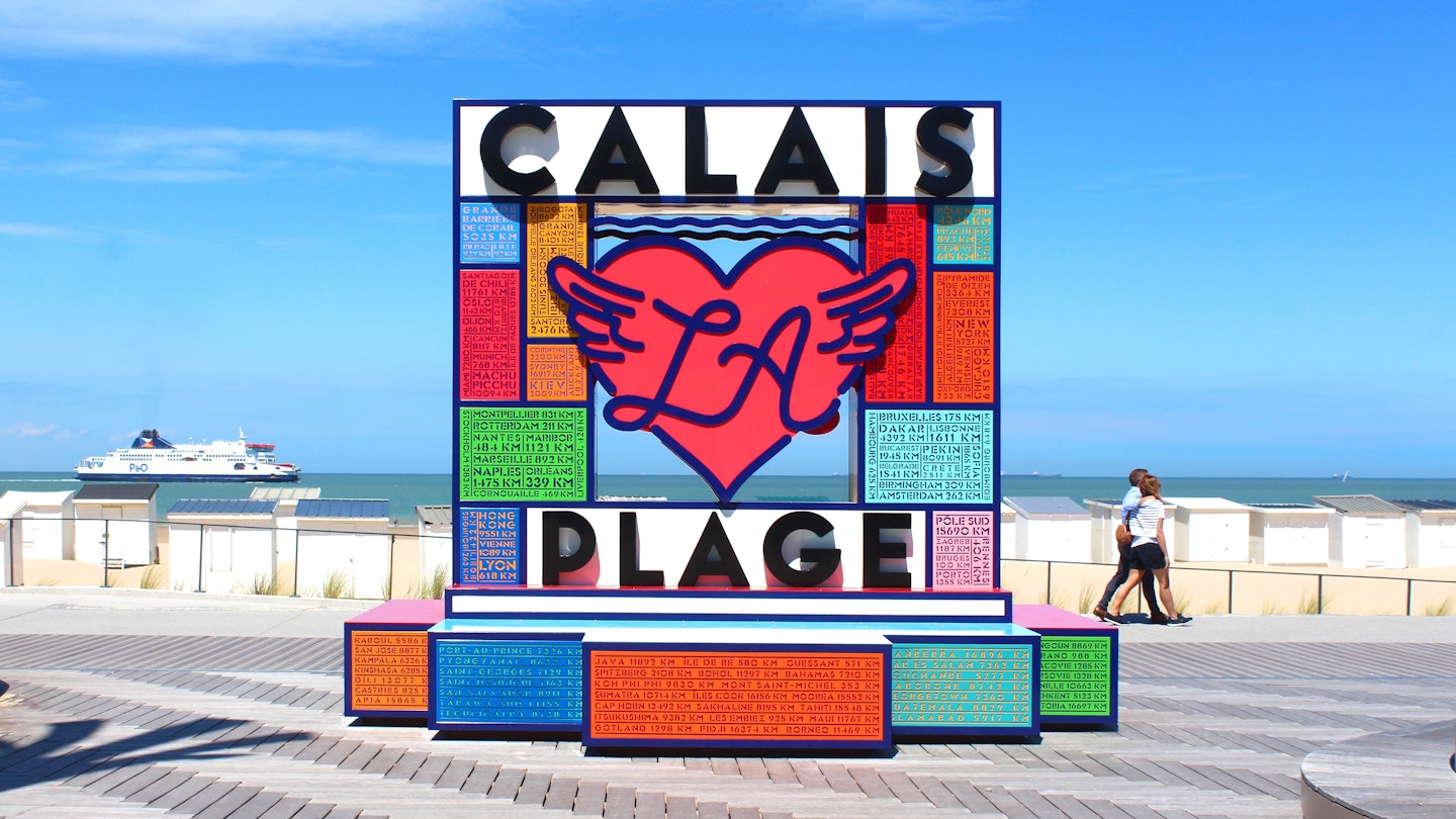 Calais, France - August 2, 2022: "Calais La Plage" totem located on the embankment of the beach of Calais, in the north of France; Shutterstock ID 2279816107; GL: 65050; netsuite: Online ed; full: Calais first time guide; name: Claire N
2279816107