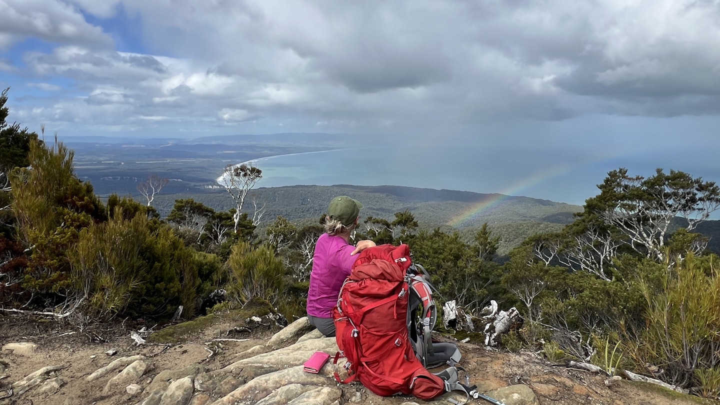 Hiker on the Hump Ridge Track, New Zealand