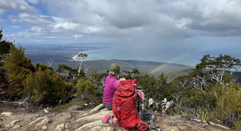 Hiker on the Hump Ridge Track, New Zealand