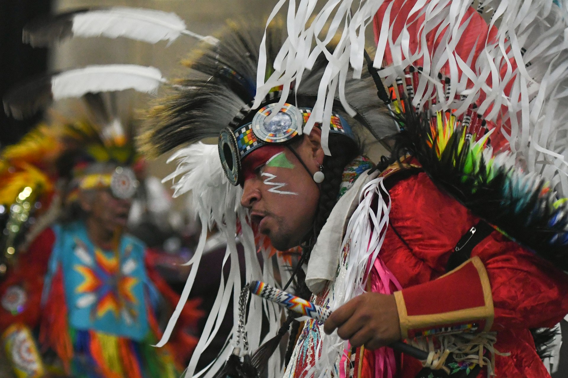 Members of the First Nations dance in regalia during the traditional Pow Wow competition, at the K-Days Festival in Edmonton