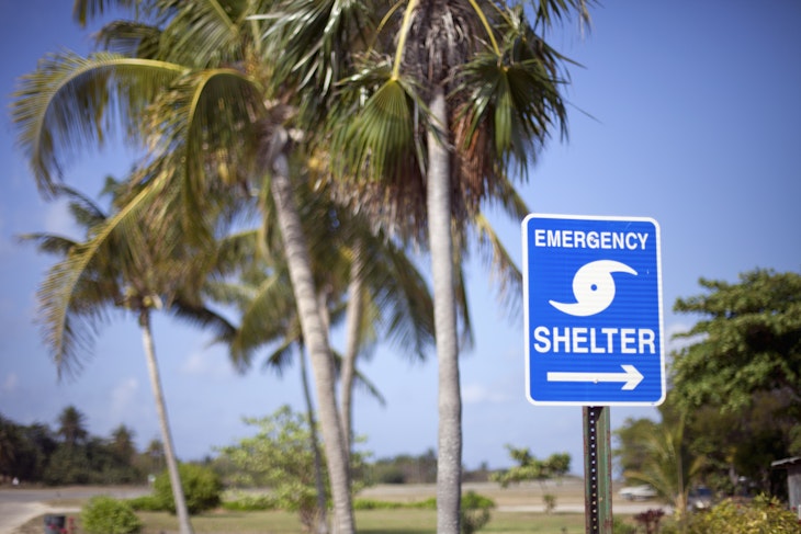 Hurricane shelter sign with Coconut Palm trees in the background on Little Cayman Island near the airport
111347853
vacation, travel, tropical destination, hurricane, remote
