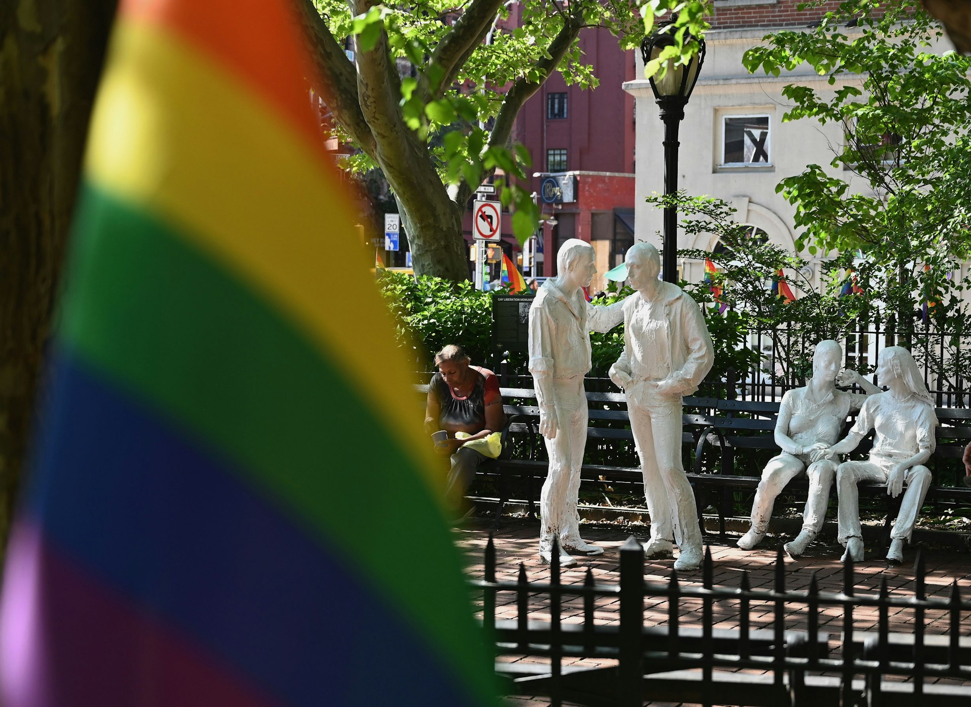 Rainbow flags and sculptures are seen at the Stonewall National Monument, West Village, New York City, New York, USA