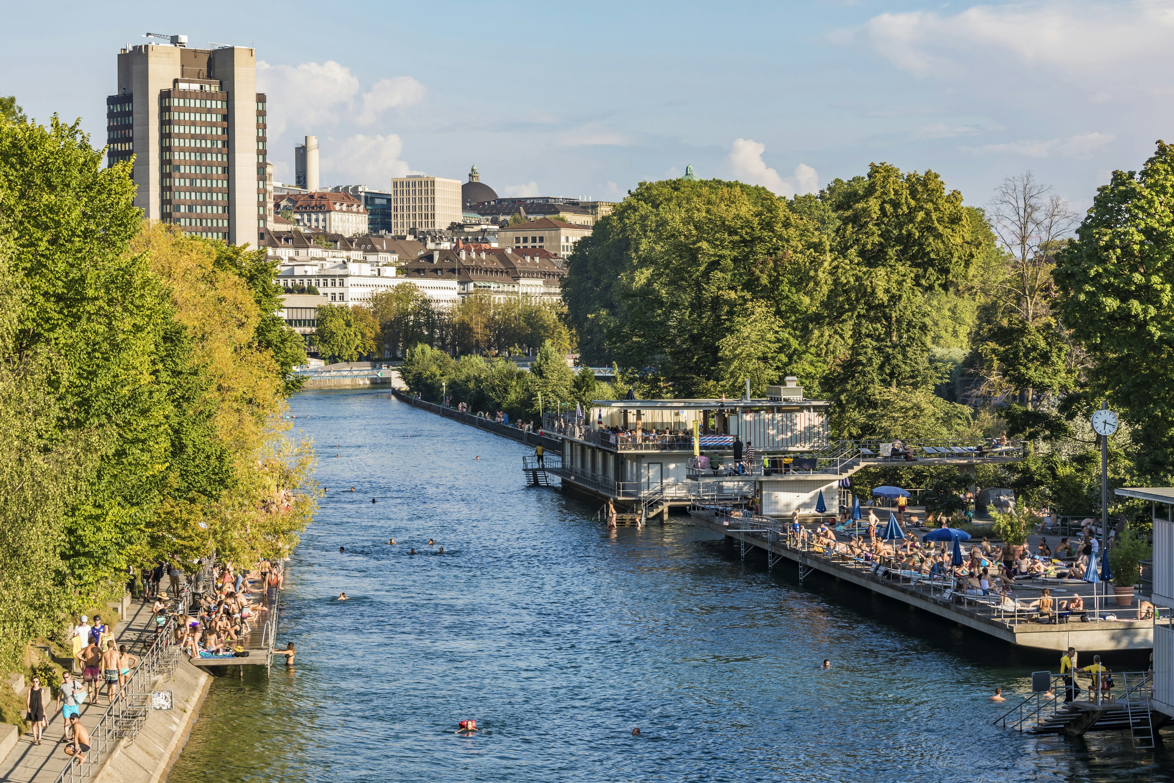 People swimming in the river in Zurich city centre