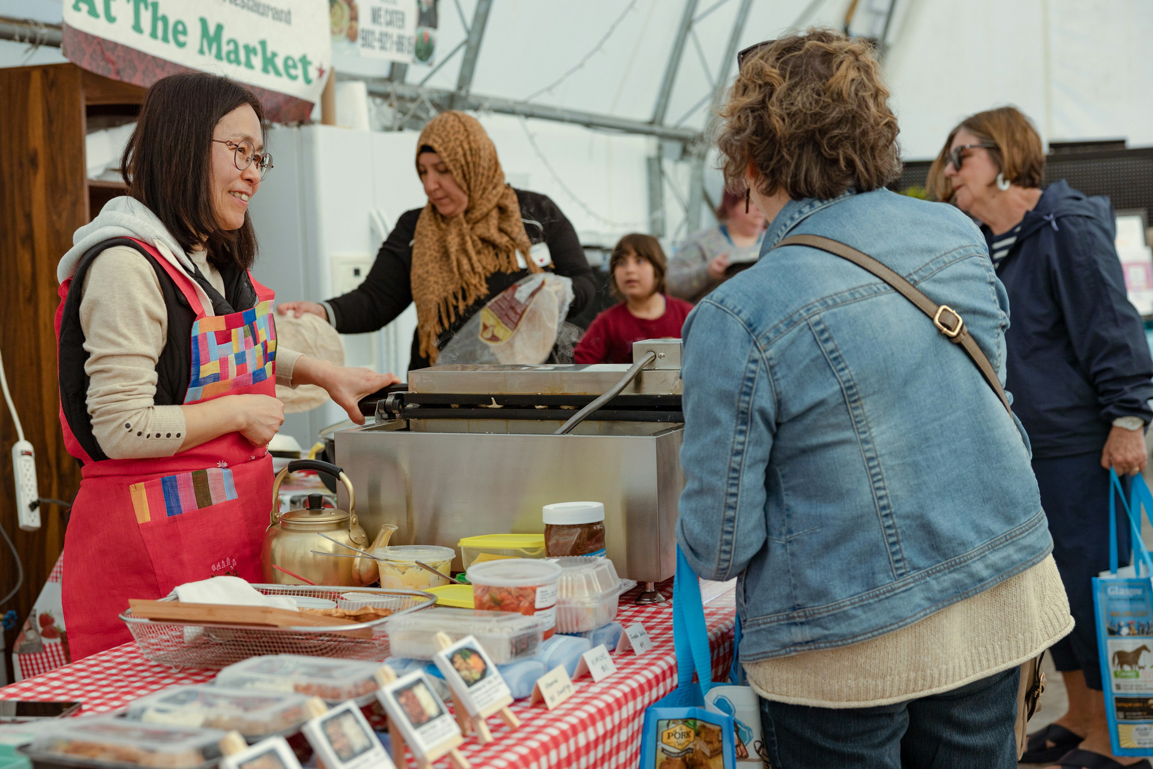 A vendor sells food at the Farmer's Market in downtown New Glasgow, Pictou County, Nova Scotia, Canada,