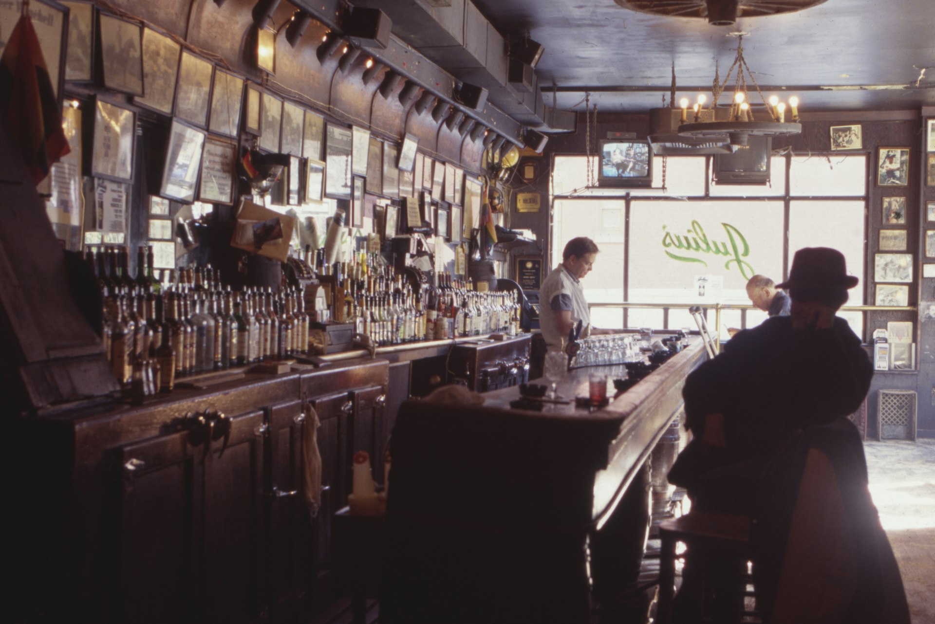 The bar at Julius’, a historic gay bar in the West Village, New York City, New York, USA